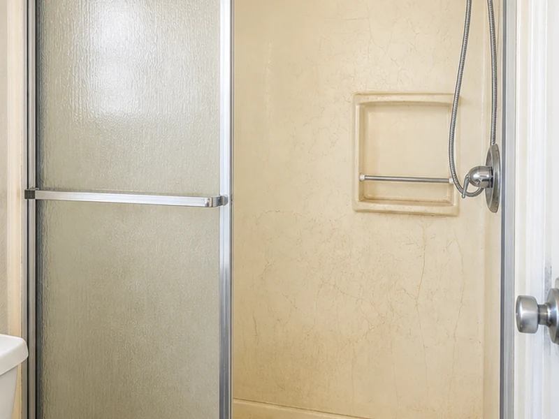 Faded, crazed fiberglass tub-and-shower combo before refinishing in a Berryessa apartment, San Jose